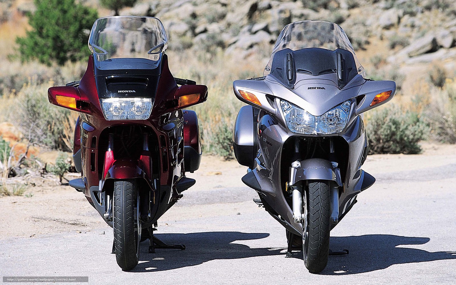Two Honda motorcycles side by side