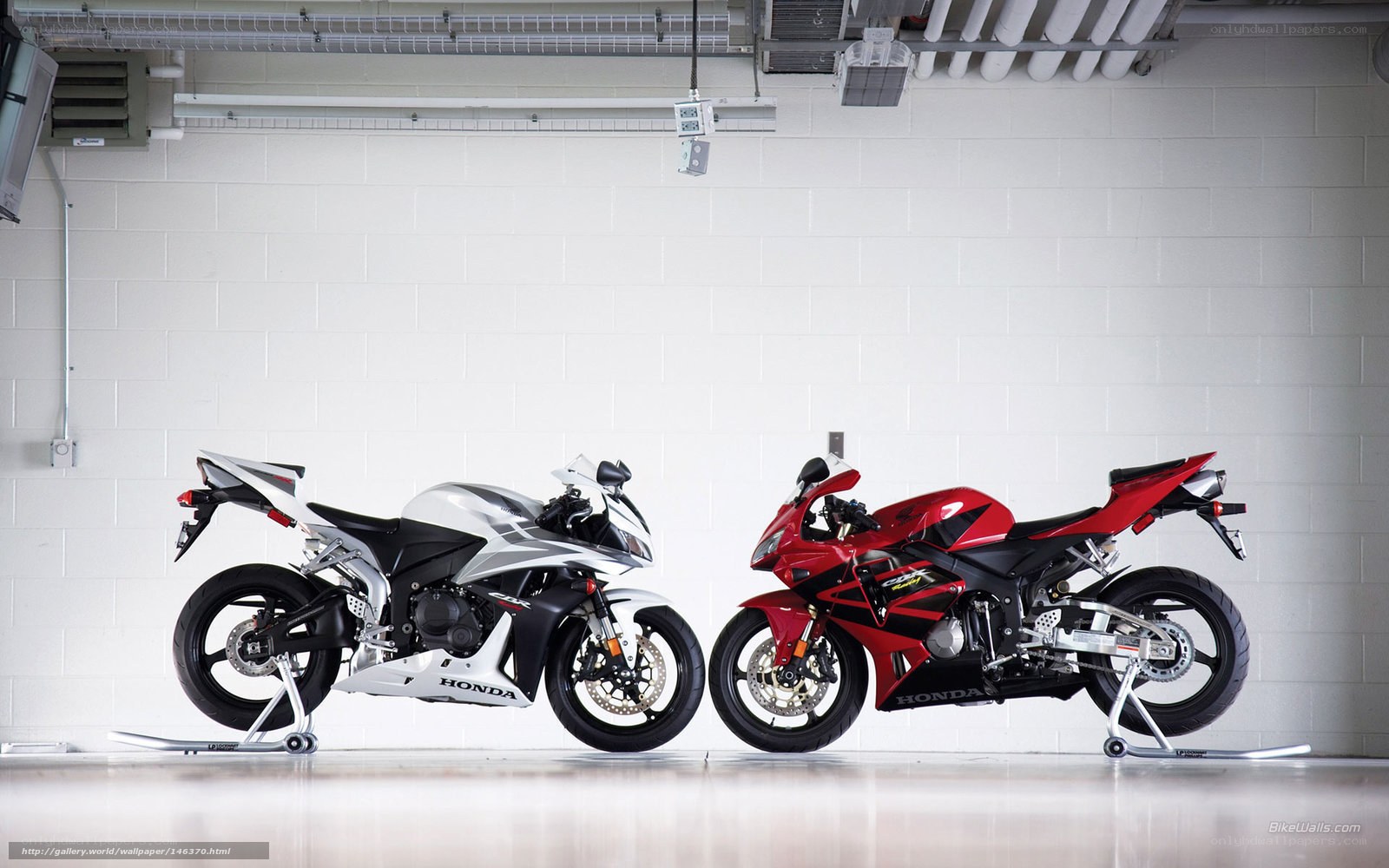 Two Honda sport motorcycles