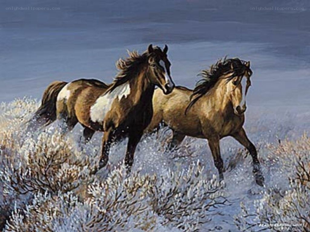 Two horses running in snow