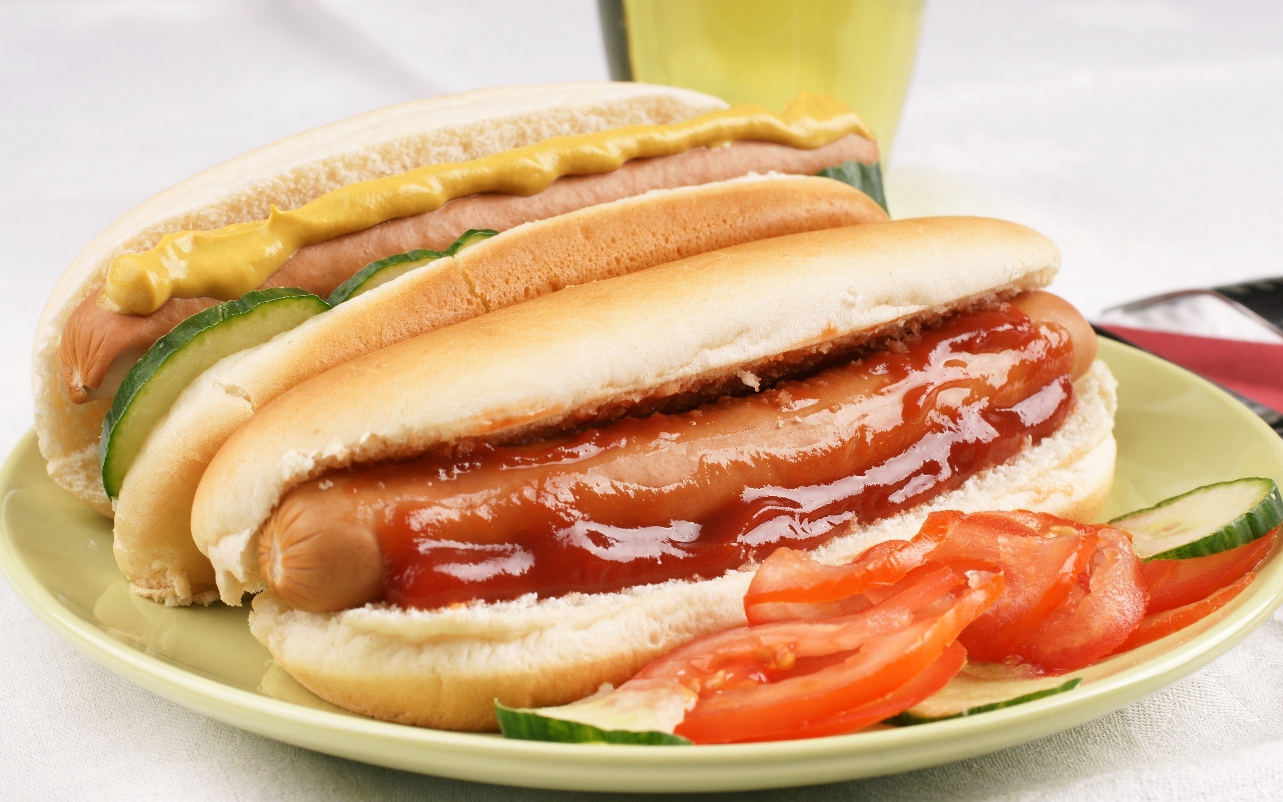 Two hot dogs on a plate