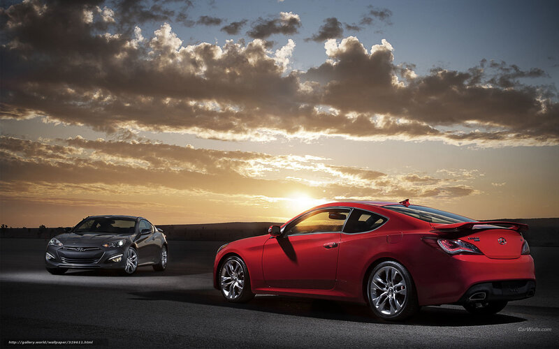 Two Hyundai coupes at sunset