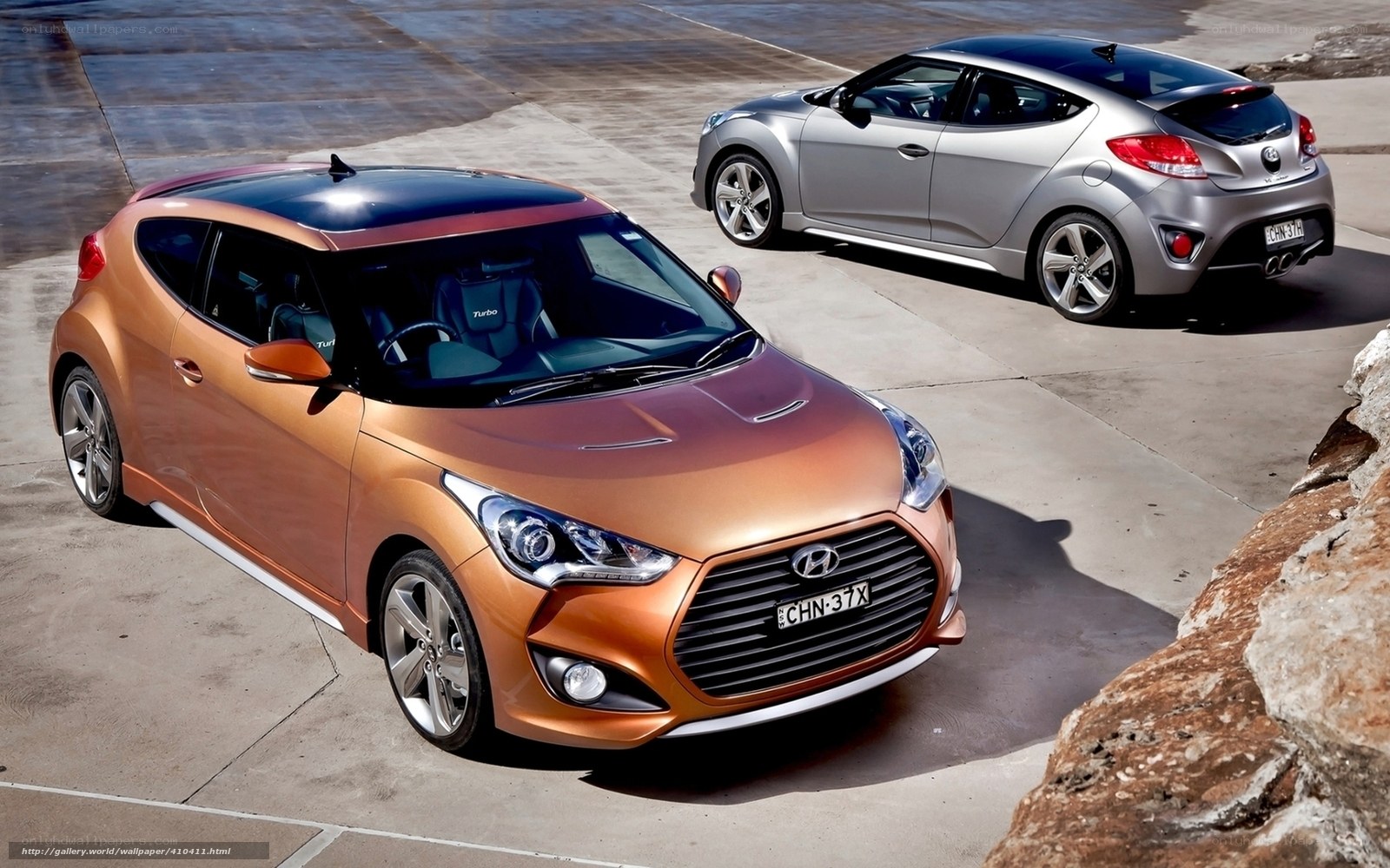 Two Hyundai Veloster cars