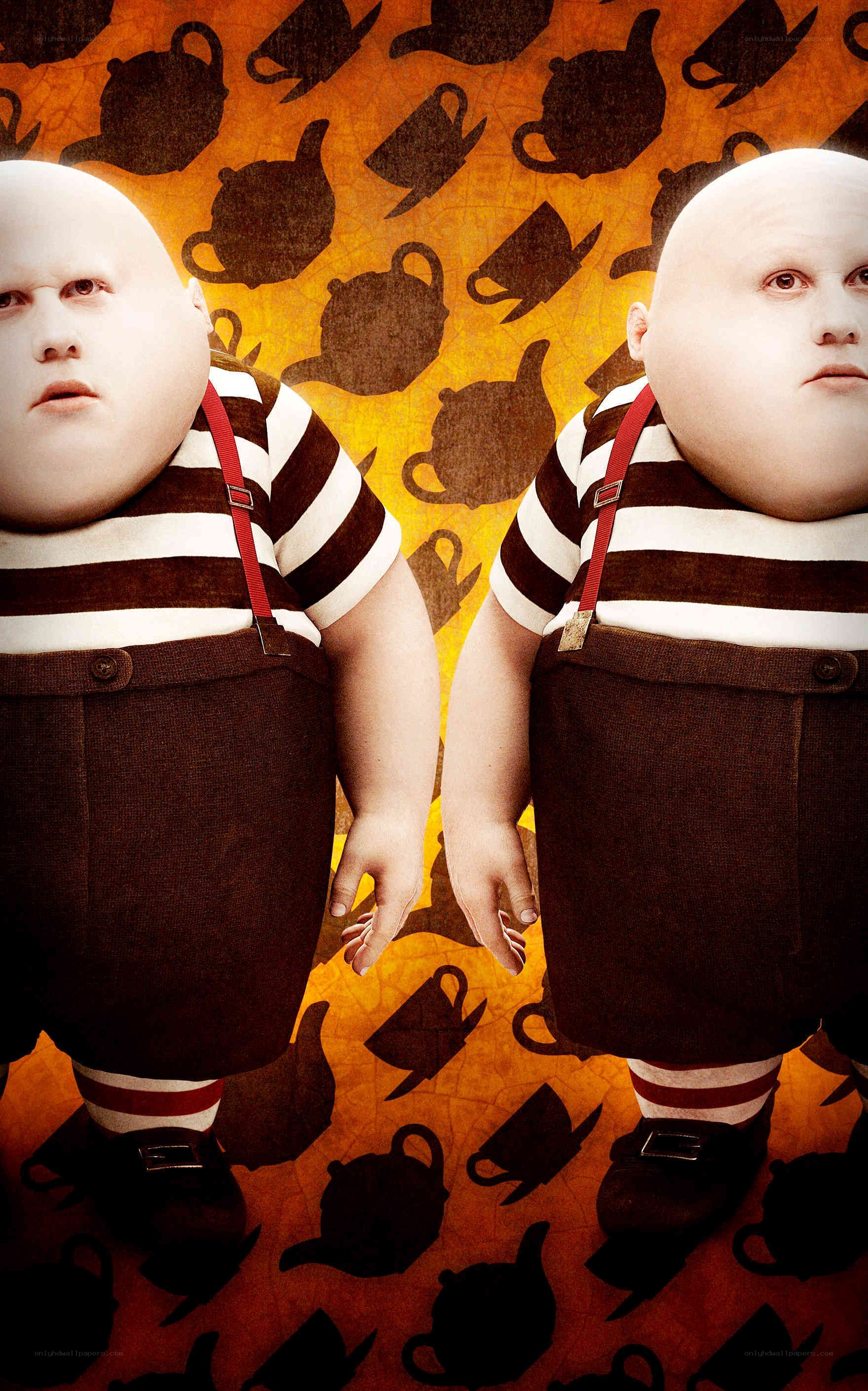 Two identical boys in striped shirts