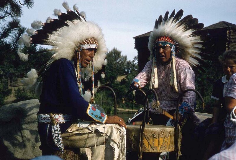 Two Indigenous Men with Headdresses