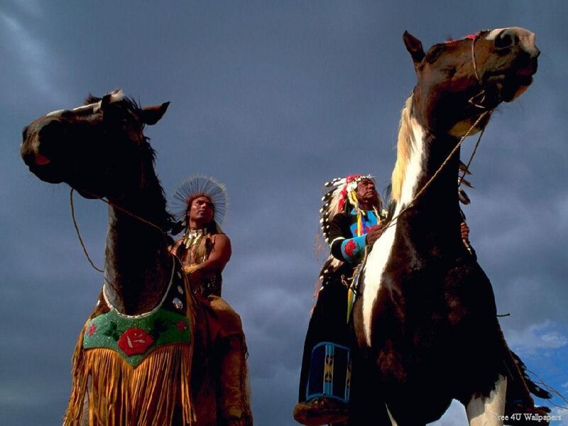 Two Indigenous Riders on Horses