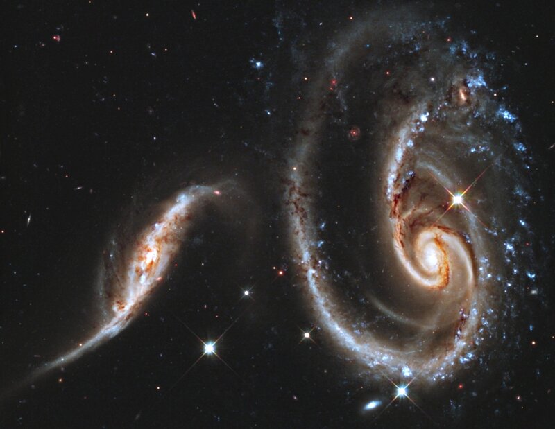 Two Interacting Spiral Galaxies — Black, Cosmic