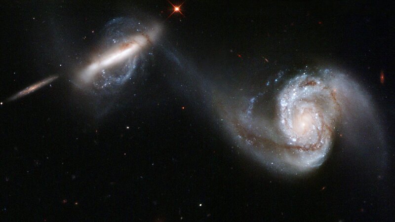Two Interacting Spiral Galaxies — Black, Dramatic