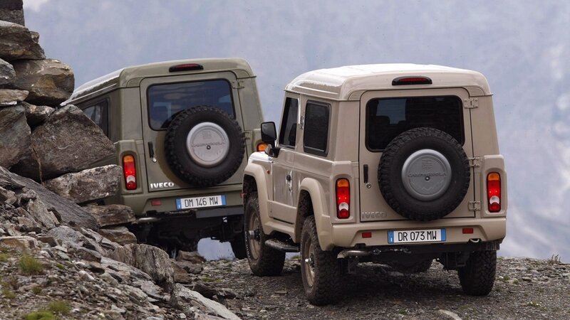 Two IVECO Campagnola vehicles on a mountain