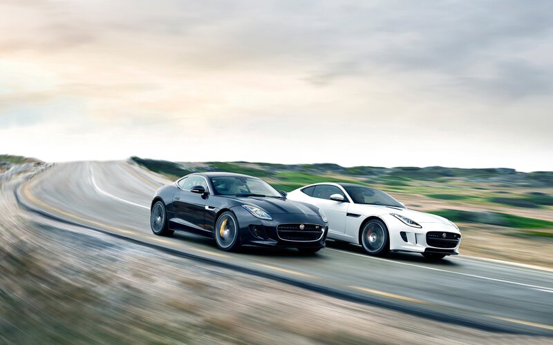 Two Jaguar Cars — Black