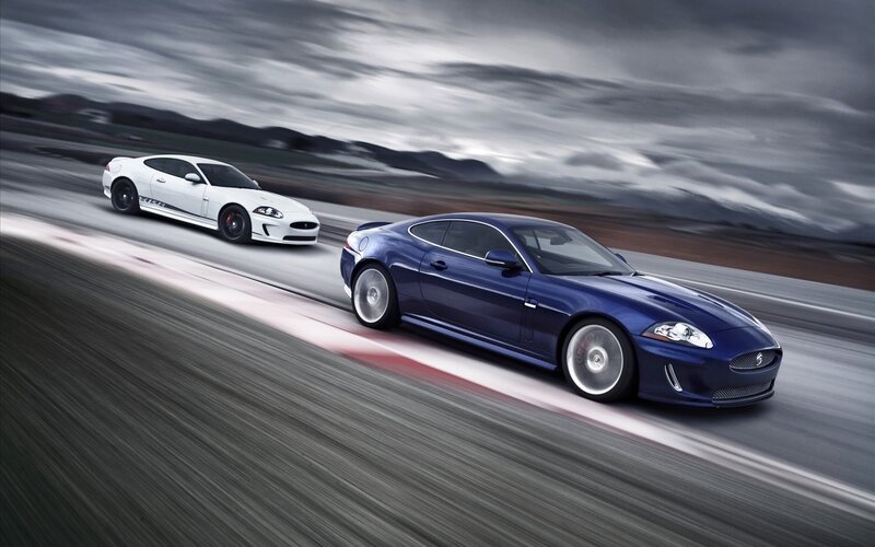 Two Jaguar Cars on Track