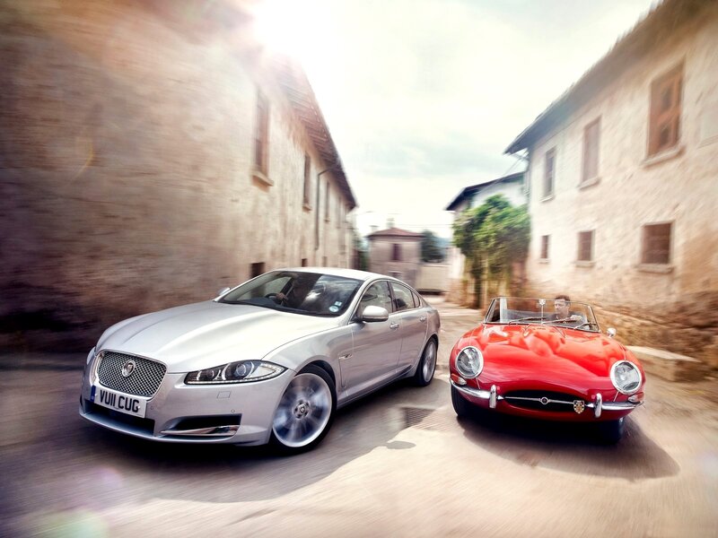 Two Jaguar Cars — Silver