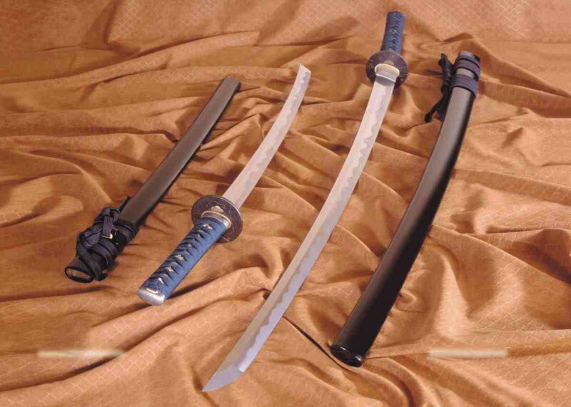 Two Japanese swords on fabric