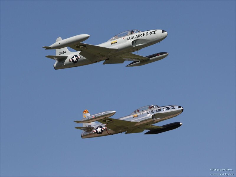 Two Jet Aircraft in Flight — Blue