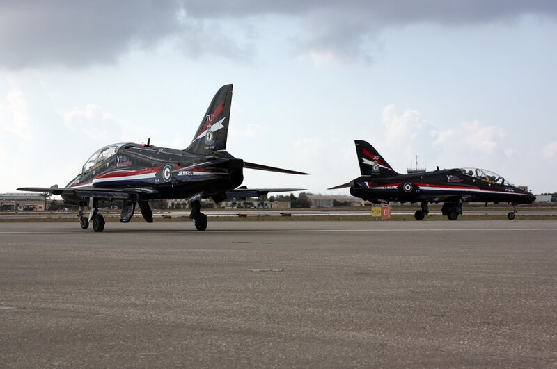 Two Jet Aircraft on Tarmac — Black