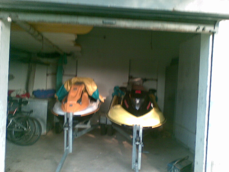 Two Jet Skis in Garage