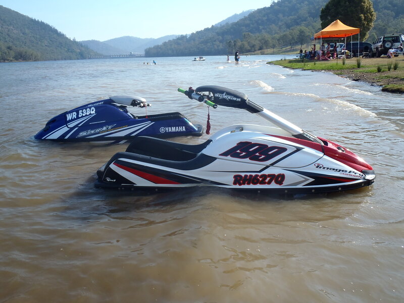 Two Jet Skis in Water