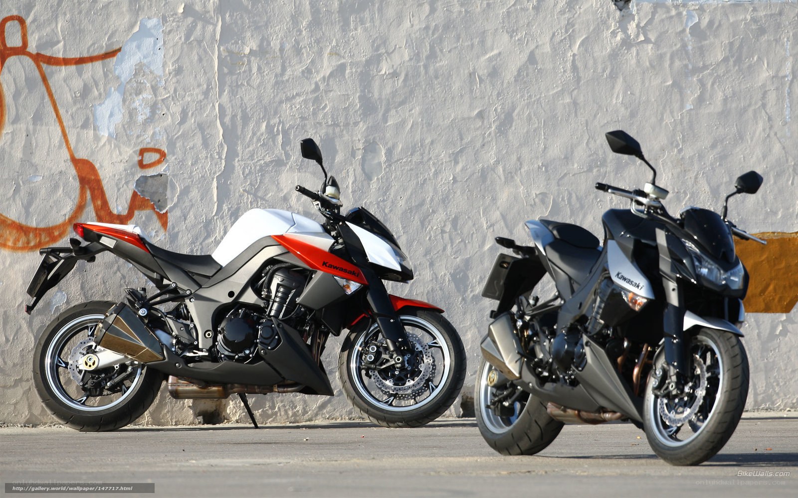 Two Kawasaki motorcycles side by side