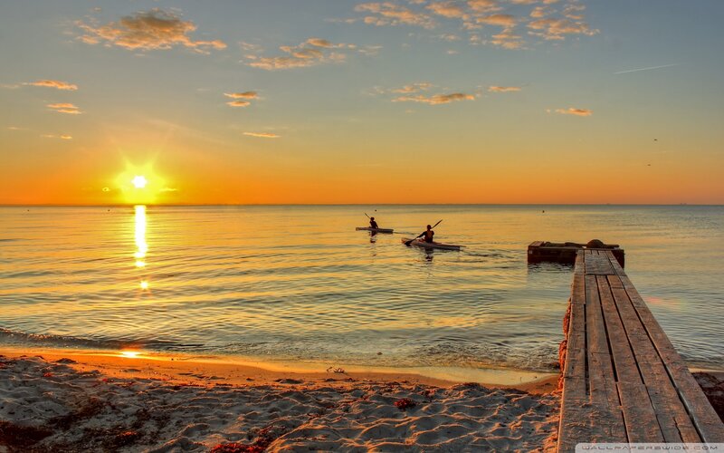 Two Kayakers at Sunset
