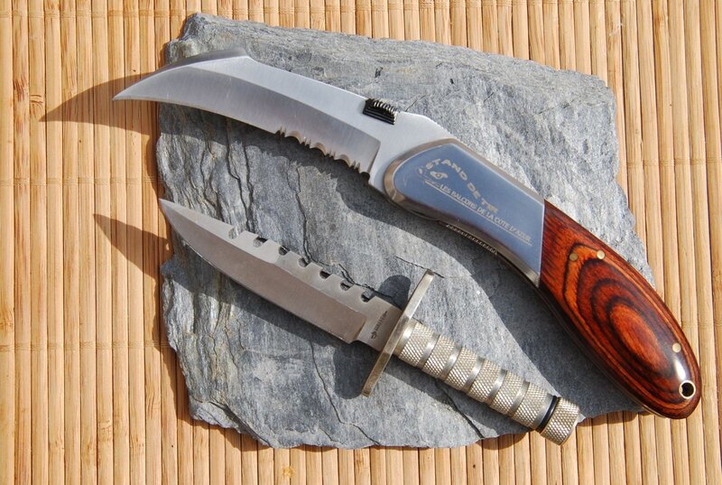 Two knives on a stone