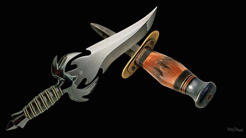 Two Knives on Black Background