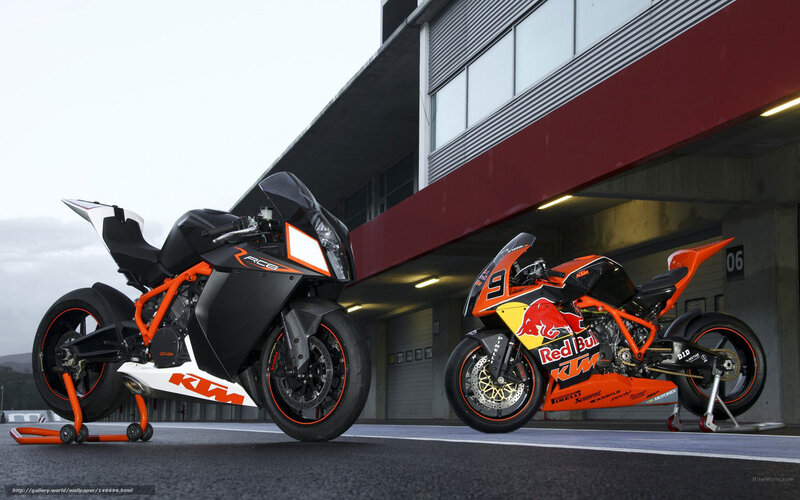 Two KTM racing motorcycles