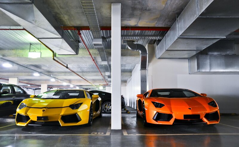 Two Lamborghini sports cars in garage