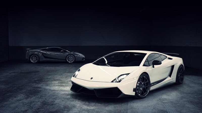 Two Lamborghini sports cars in garage
