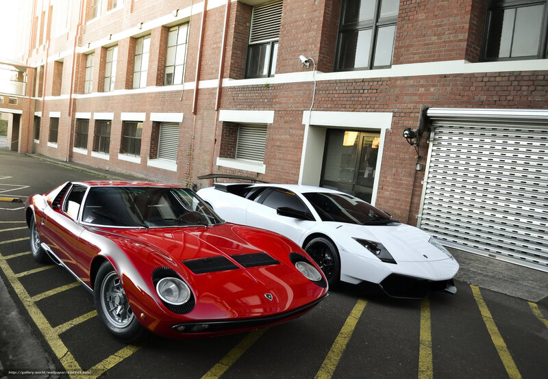 Two Lamborghini sports cars parked
