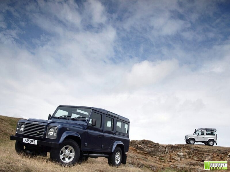 Two Land Rover Vehicles — Blue