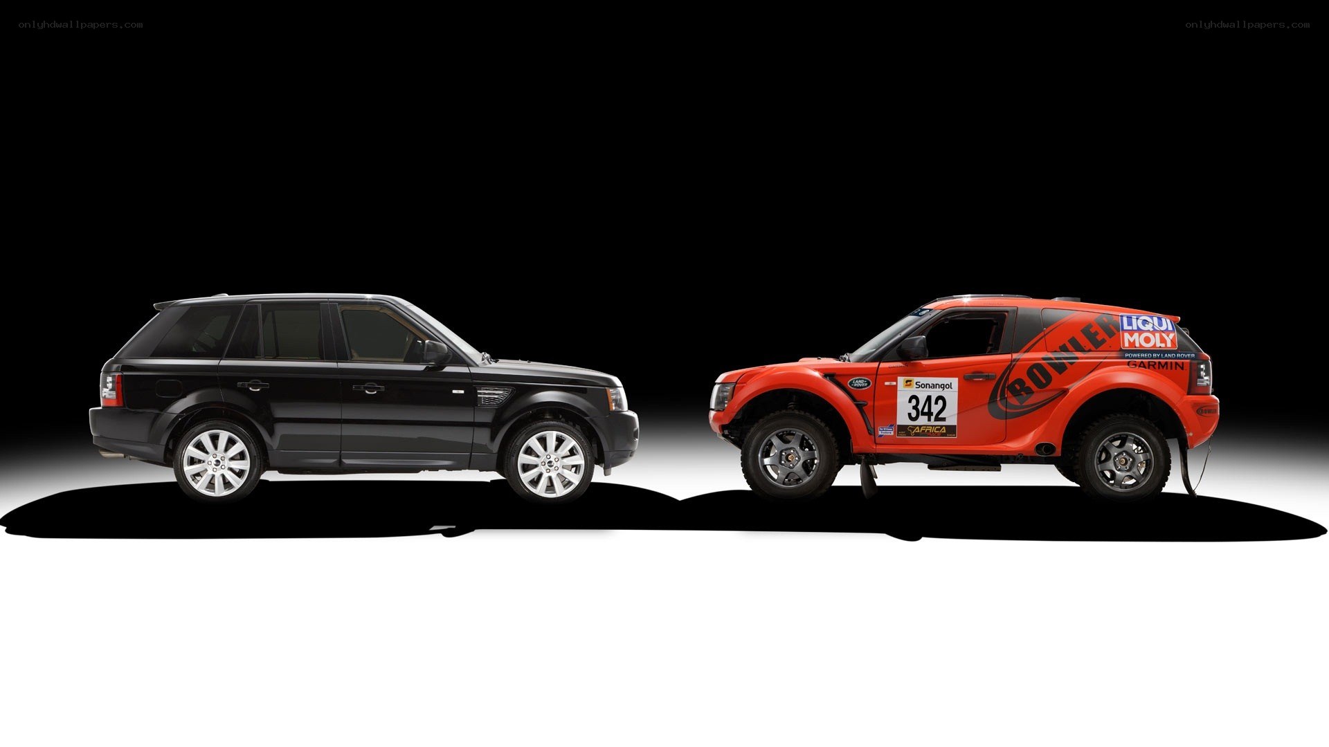 Two Land Rover vehicles side by side