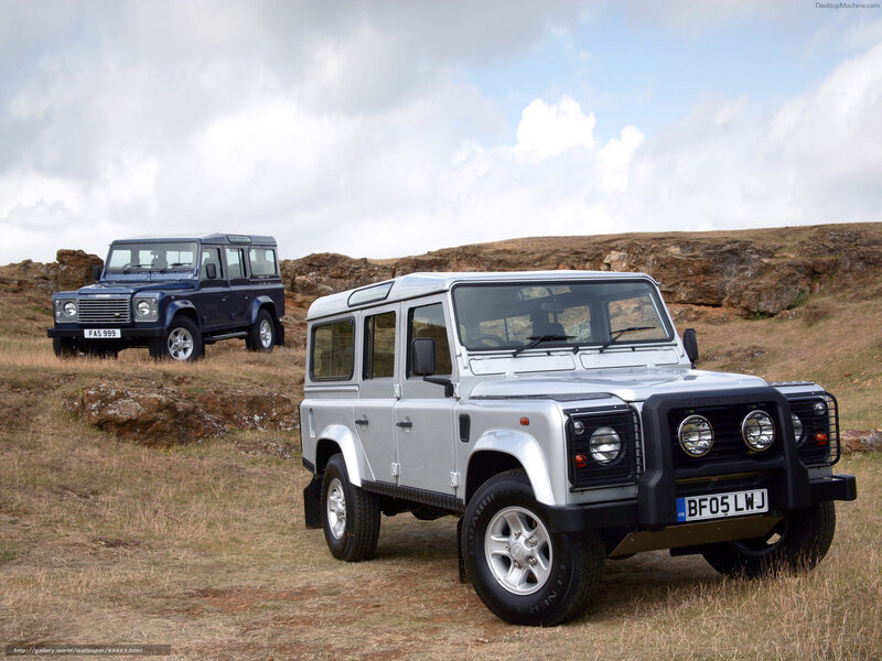 Two Land Rover Vehicles — Silver