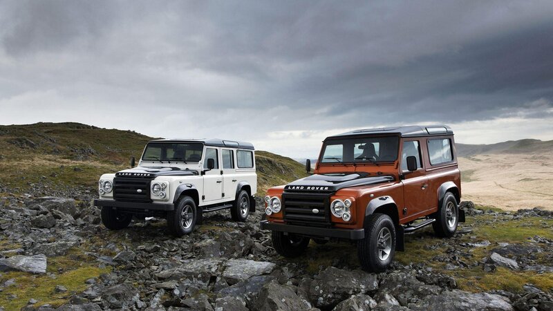 Two Land Rover Vehicles — White