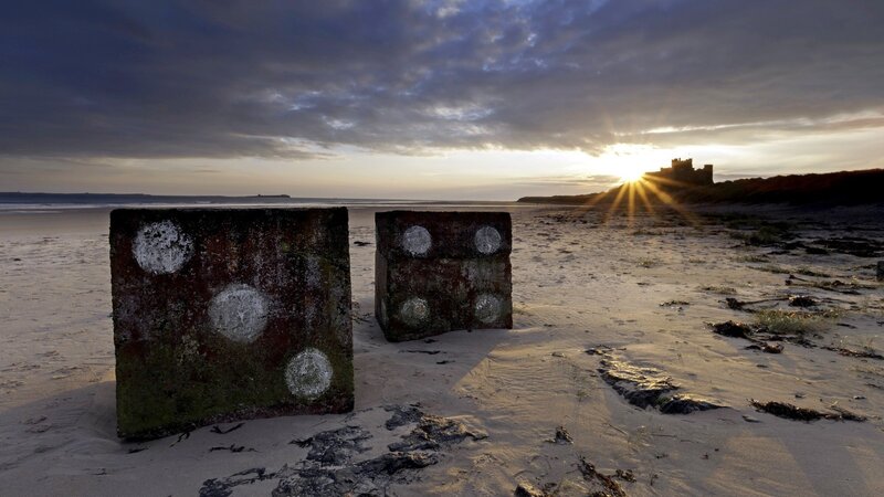 Two Large Dice on Beach