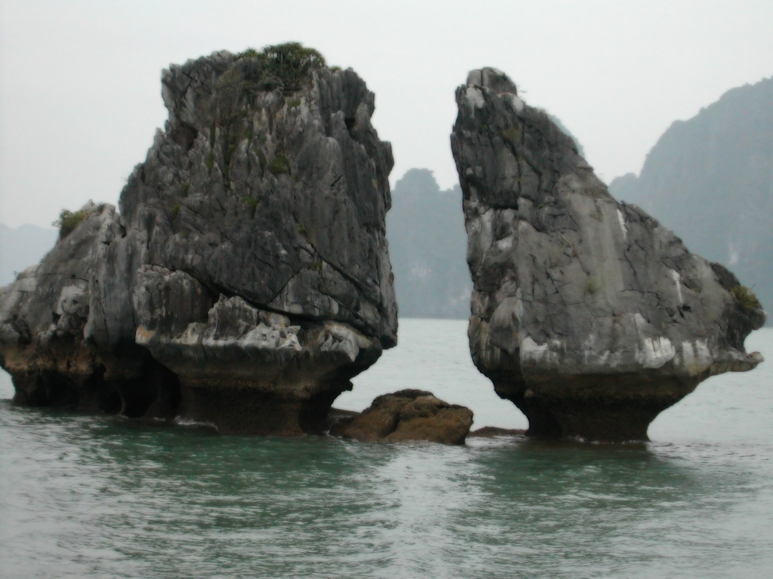 Two large rock formations in the sea