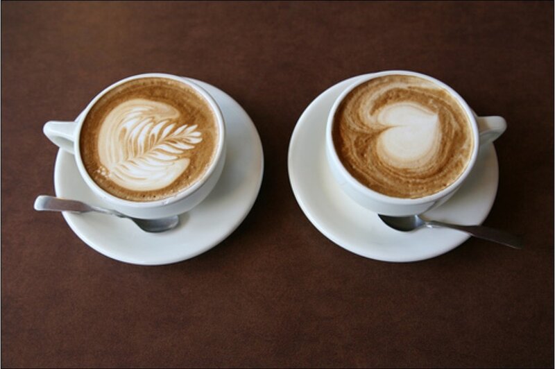 Two lattes with latte art