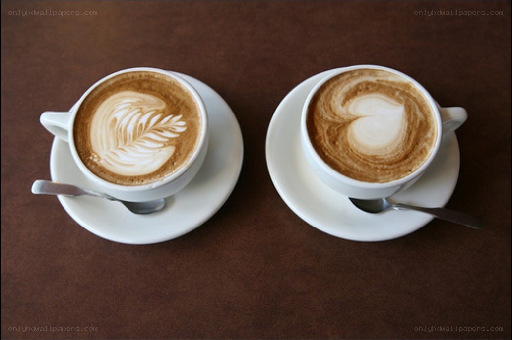 Two lattes with latte art