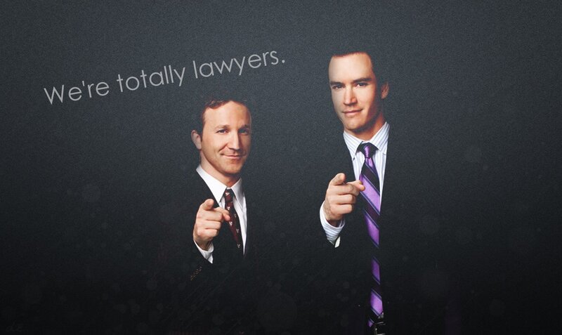 two lawyers pointing