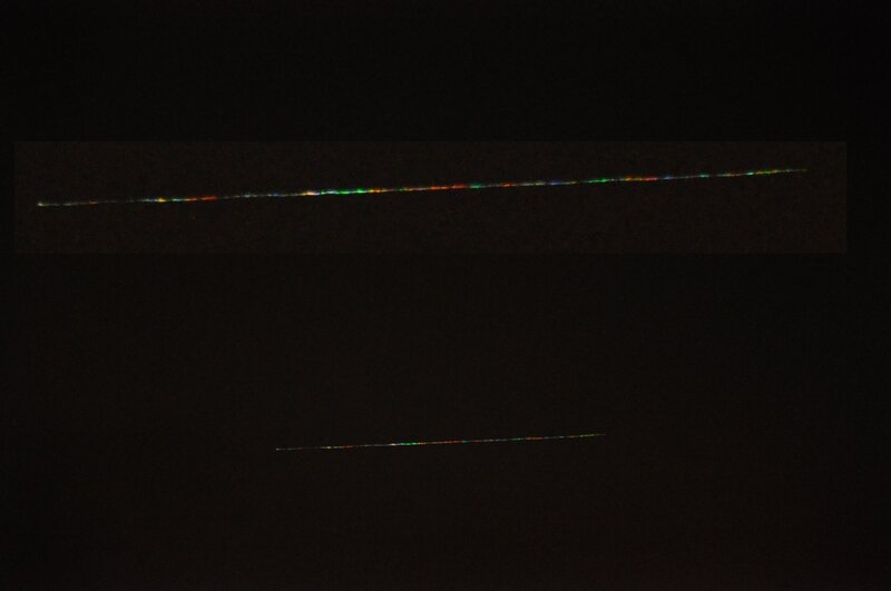 two light trails in dark sky