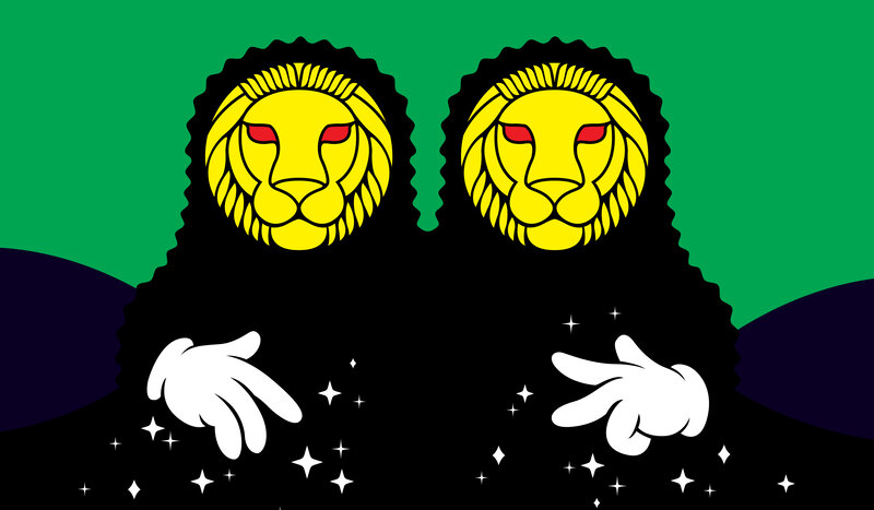 two lions on green background