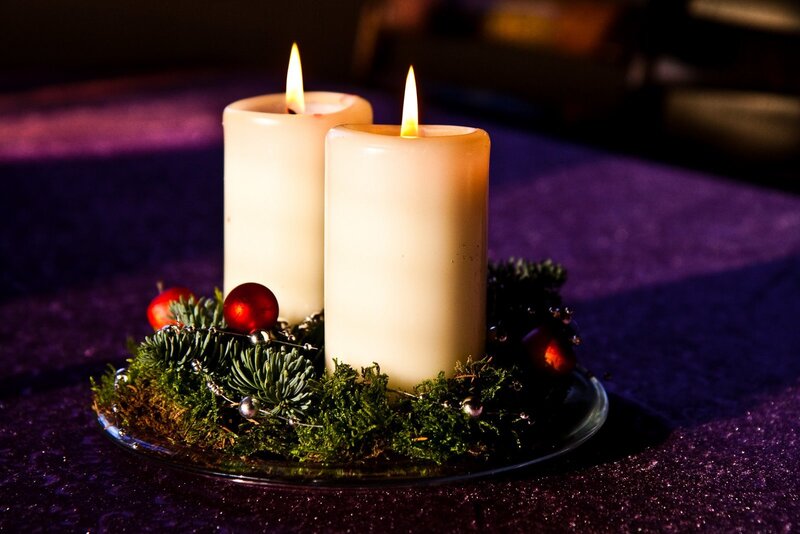 Two Lit Candles in Wreath