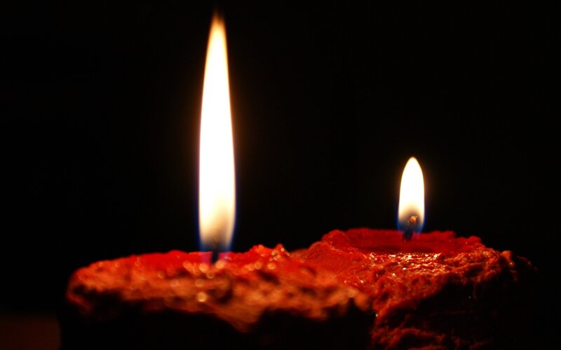 Two Lit Candles — Red, Dramatic, Night