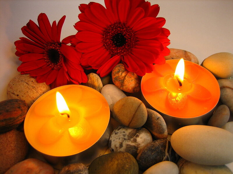 Two Lit Candles with Flowers — Red