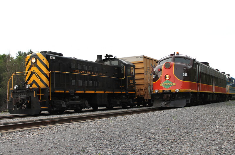 Two Locomotives on Tracks — Black