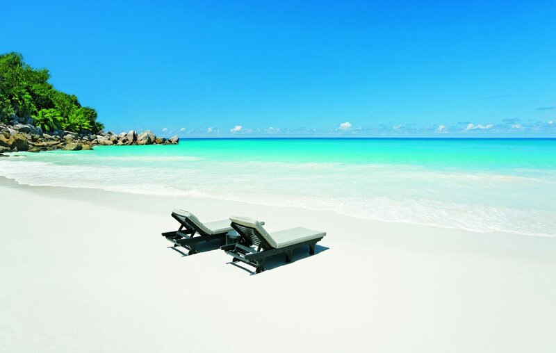 Two Lounge Chairs on Beach — Blue, Serene, Afternoon, Photograph, Ocean