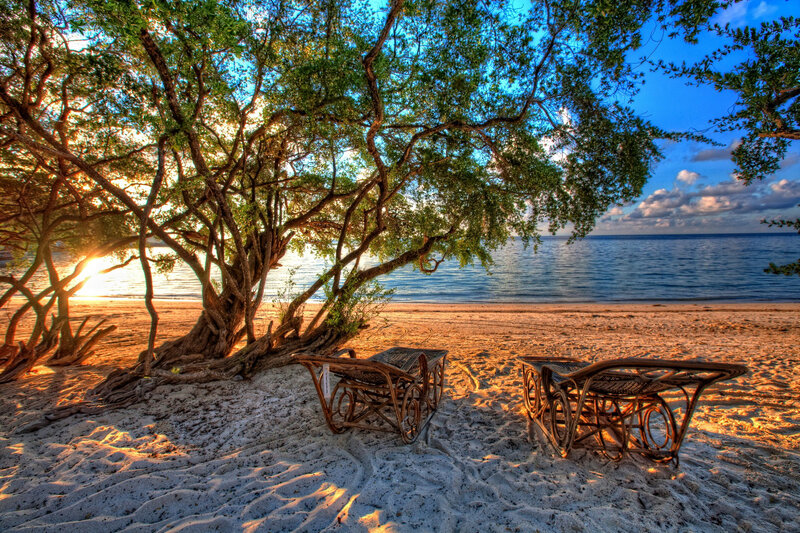 Two Lounge Chairs on Beach — Blue, Serene, Sunset
