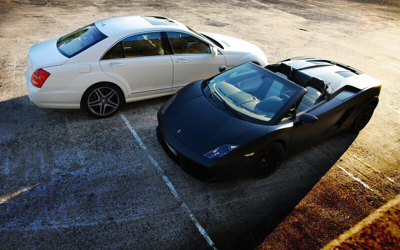 Two Luxury Cars — White