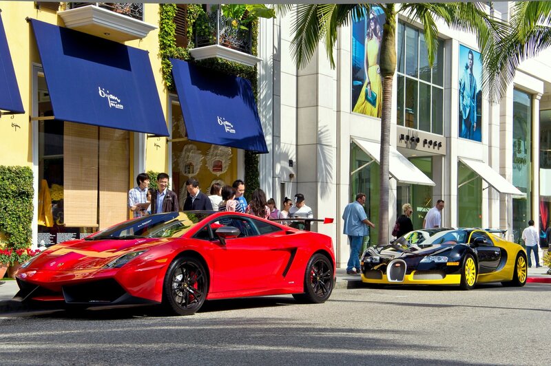 Two Luxury Sports Cars — Red, Bright