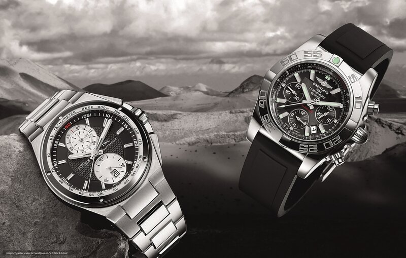Two luxury watches on rocky terrain