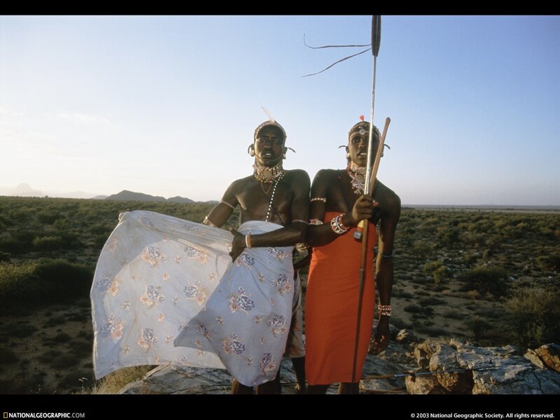 Two Maasai warriors in the savanna