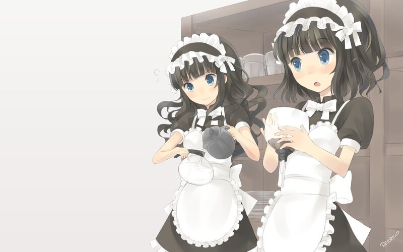 two maids in a kitchen